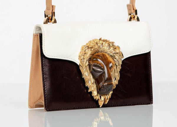 Gold lion bag clearance