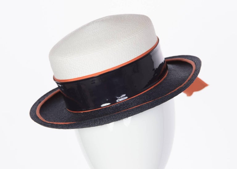 1960s Yves Saint Laurent Ivory and Navy Derby Hat Patent Leather Orange Hatband