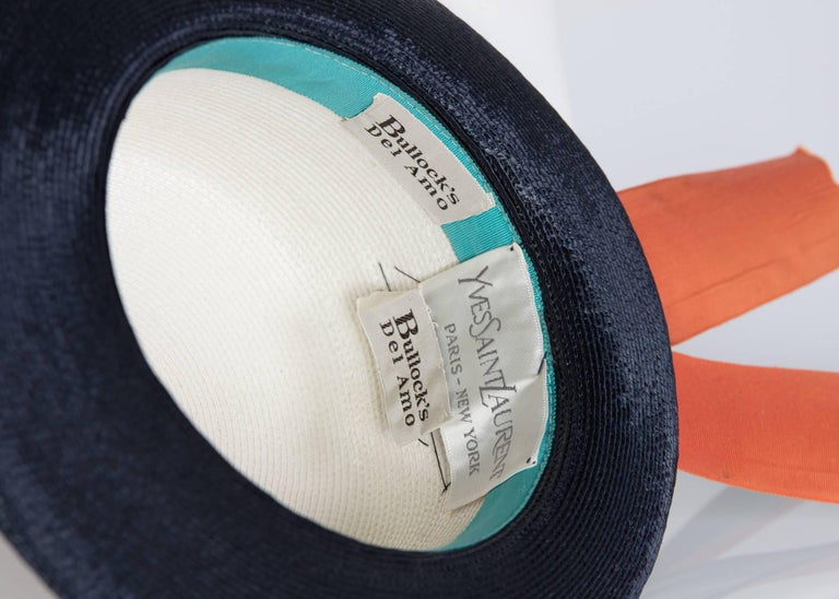 1960s Yves Saint Laurent Ivory and Navy Derby Hat Patent Leather Orange Hatband