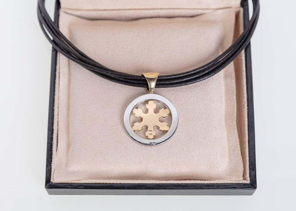 Bulgari Gold Stainless Steel Tondo Snow Flake Pendant Leather Rope Necklace
