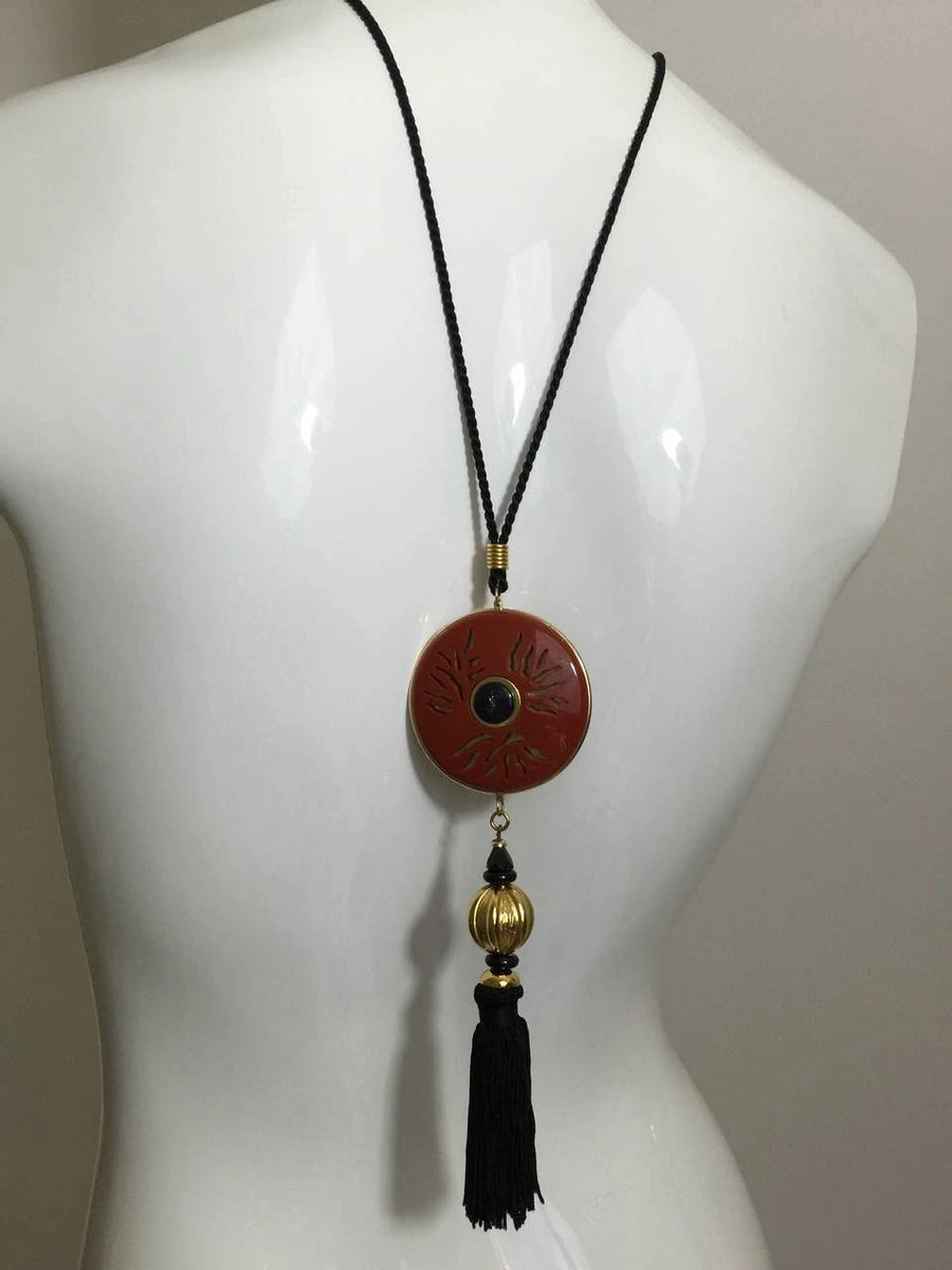 Yves Saint Laurent Vintage Opium Pendant & Gold Bead Black Tassel Yves Saint Laurent Vintage Opium Pendant & Gold Bead Black Tassel